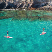 Surfeurs SUP dans la baie de Morro Jable
