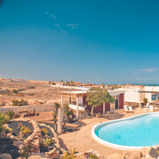 Surfvilla Fuerteventura, bungalow avec piscine et vue sur la mer
