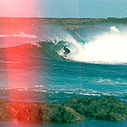 Surf, surfeur en tube